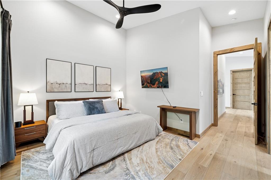 714 Scouts Overlook Lane Morganton, GA 30560 - Photo 34 of 48 a bedroom with a bed and a painting on the wall