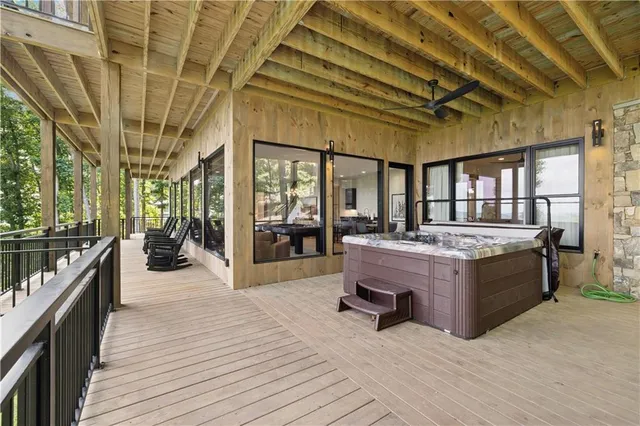 a view of a yard with plants and a bench