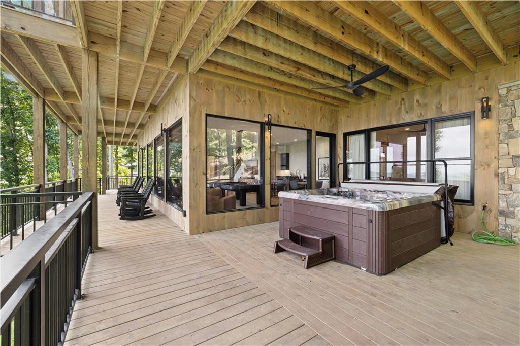 714 Scouts Overlook Lane Morganton, GA 30560 - Photo 41 of 48 a large room with wooden floor and furniture