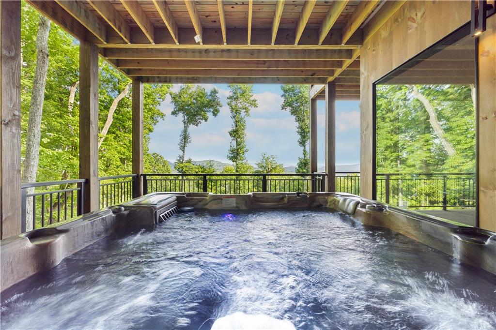 714 Scouts Overlook Lane Morganton, GA 30560 - Photo 42 of 48 a view of a porch with wooden floor and outdoor space