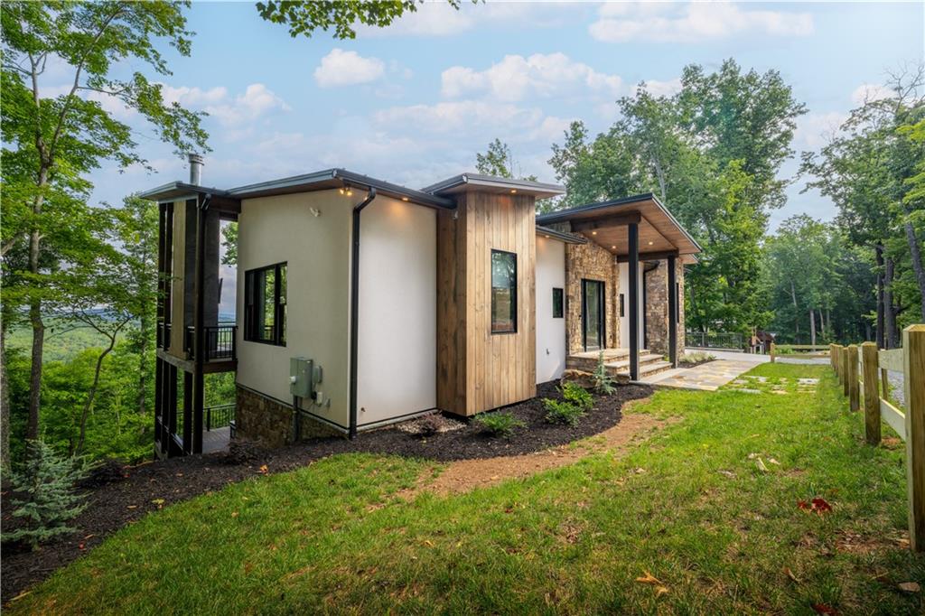 714 Scouts Overlook Lane Morganton, GA 30560 - Photo 9 of 48 a view of a house with backyard