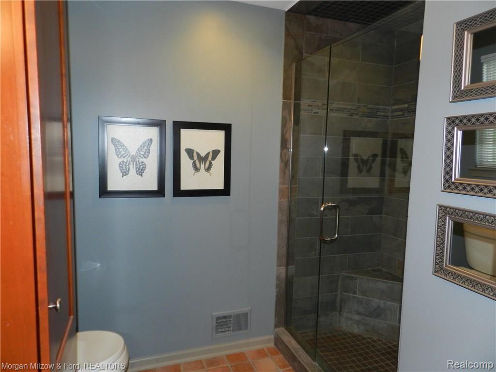 6572 Summit Ridge Court, Unit 35 Clarkston, MI 48346 - Photo 15 of 43 Master Bath, tasteful file shower.