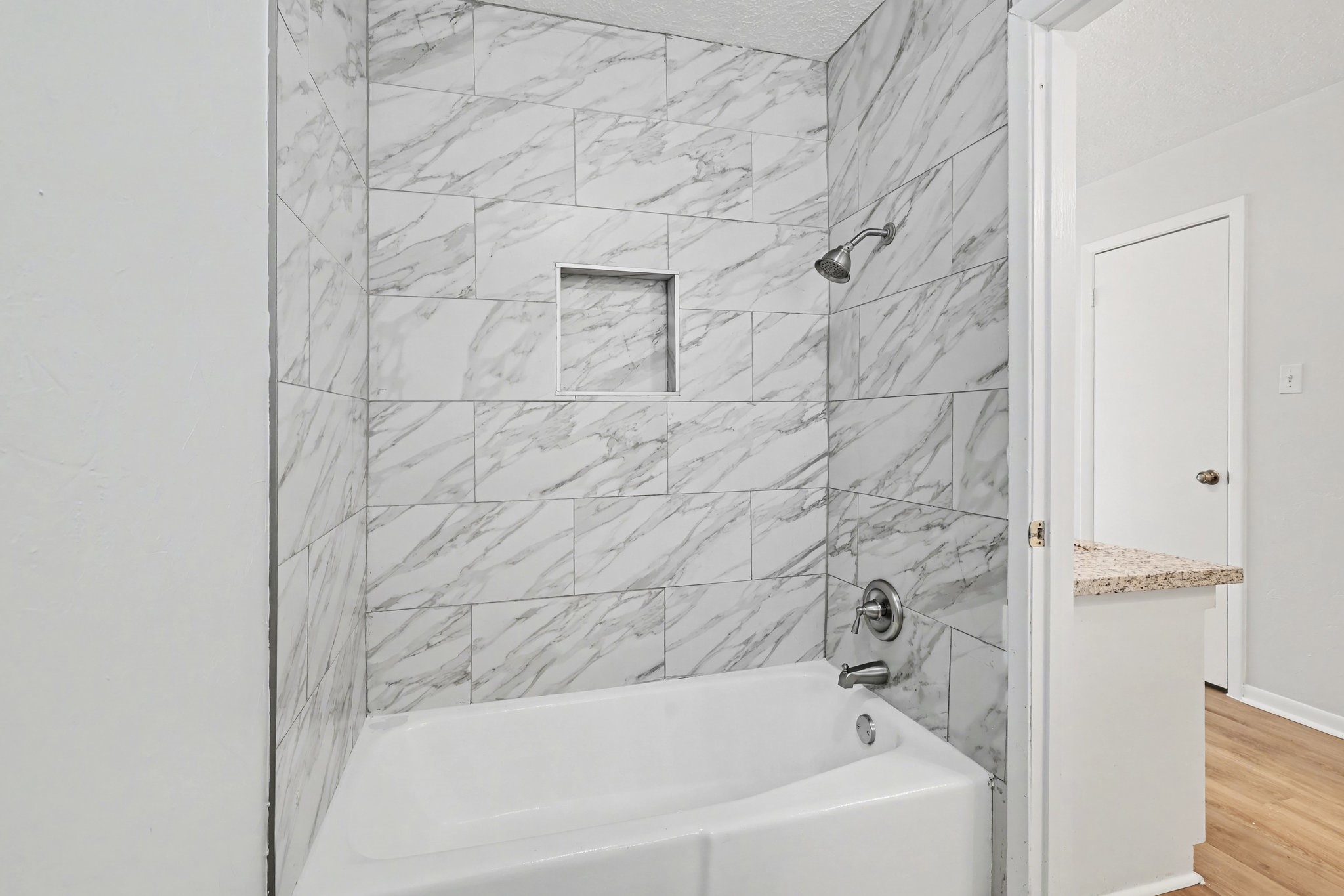 6910 Chancellor Drive Spring, TX 77379 - Photo 24 of 41 a bathroom with a bathtub