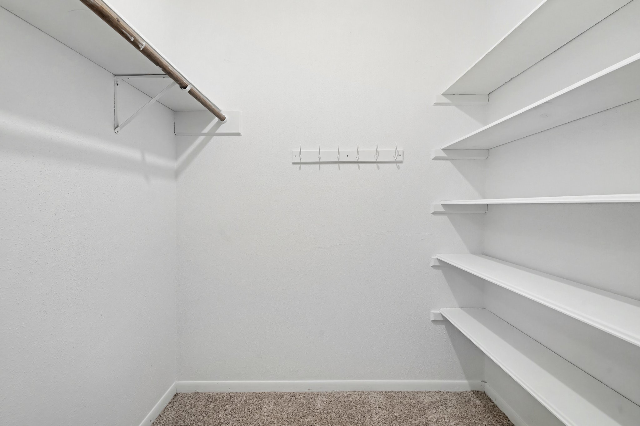 6910 Chancellor Drive Spring, TX 77379 - Photo 25 of 41 a view of small space with racks on the wall