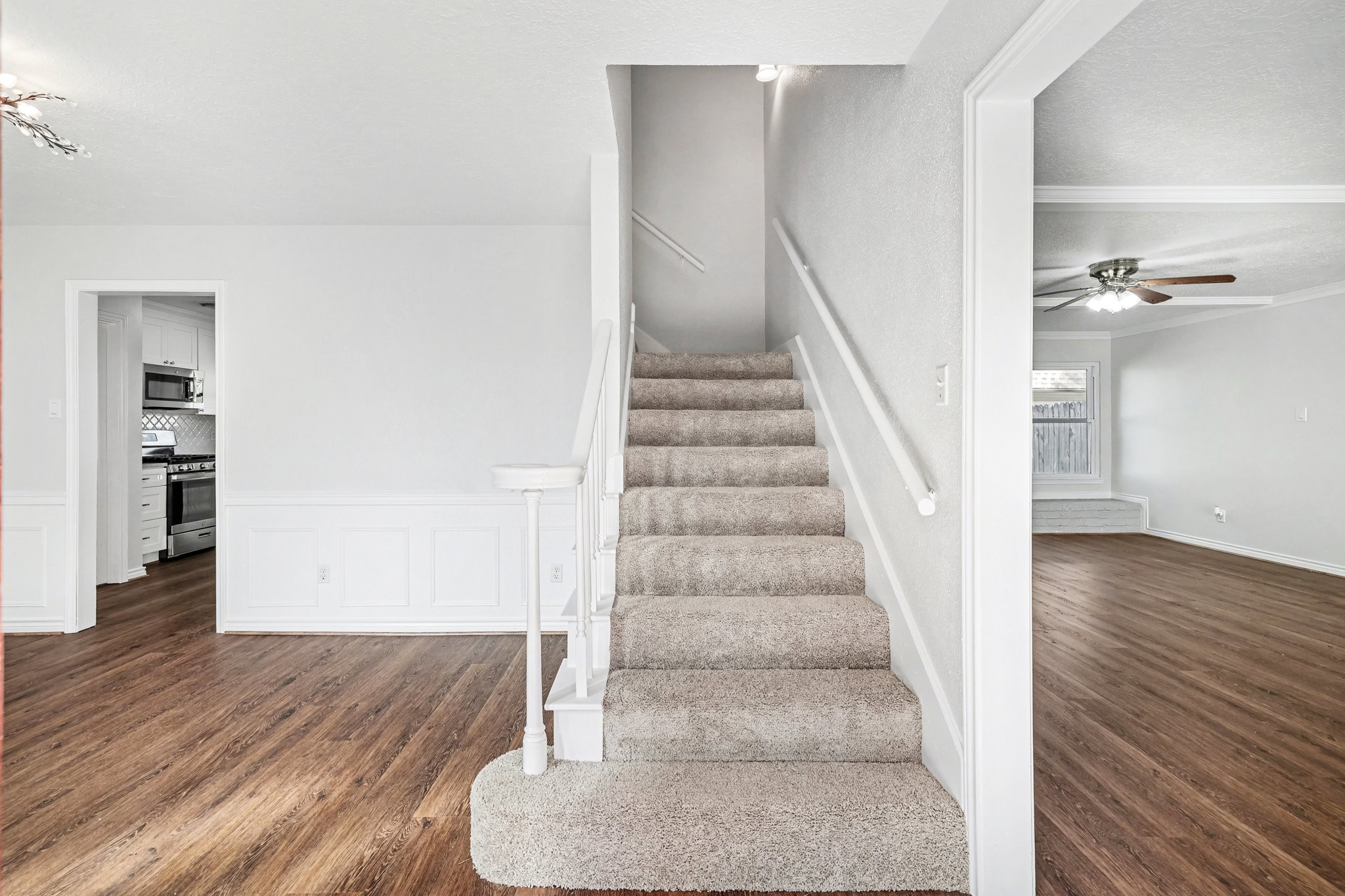 6910 Chancellor Drive Spring, TX 77379 - Photo 4 of 41 a view of entryway and hall with wooden floor