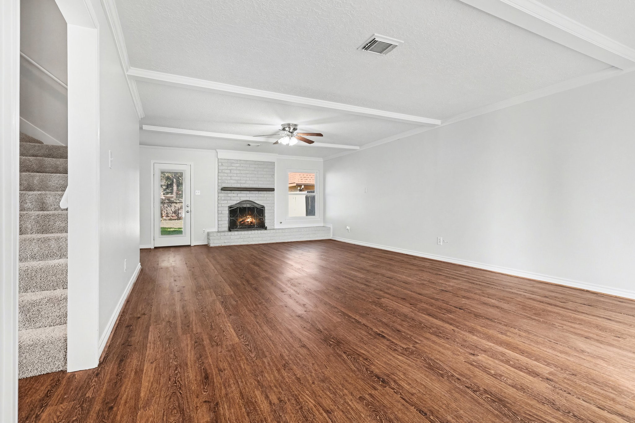 6910 Chancellor Drive Spring, TX 77379 - Photo 9 of 41 a view of empty room with wooden floor