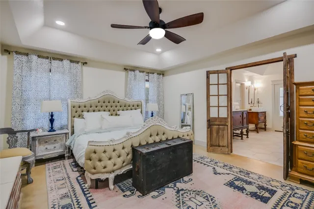 a bed room with a bed and a couch