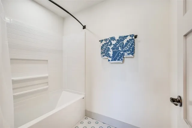 a view of hallway with washer and dryer