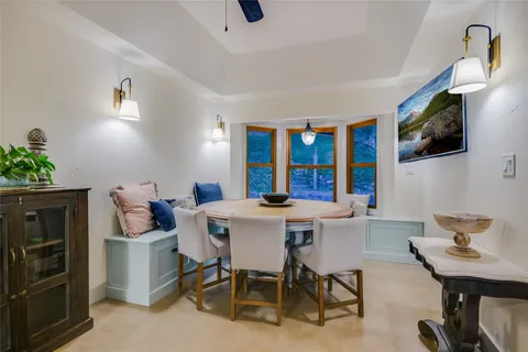 a view of a dining room with furniture