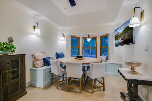a view of a dining room with furniture