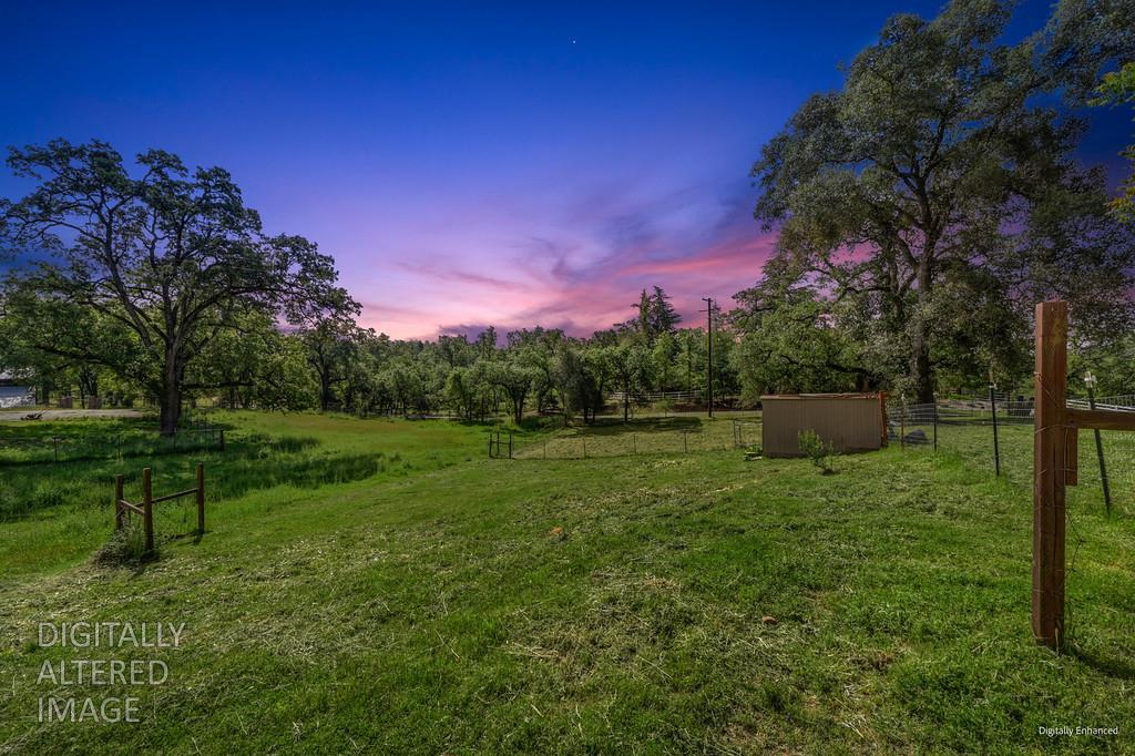 6181 Lambert Lane El Dorado, CA 95623 - Photo 56 of 68 yard at dusk featuring a rural view and an outdoor structure