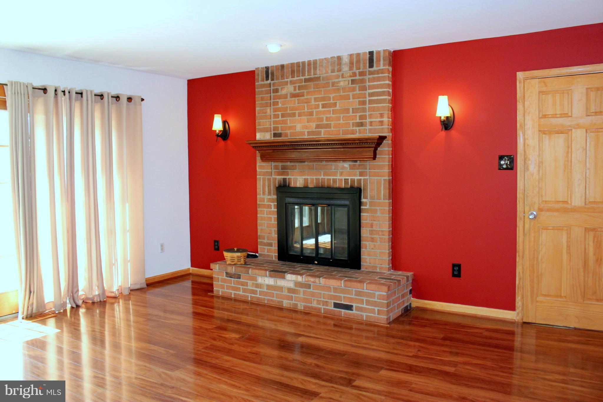 8707 Crystal Rock Lane Laurel, MD 20708 - Photo 12 of 30 Family Room w/ Wood Burning Fireplace