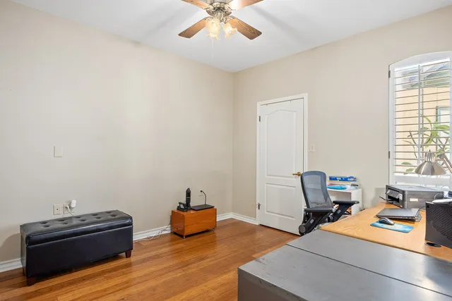 a room with furniture and a wooden floor
