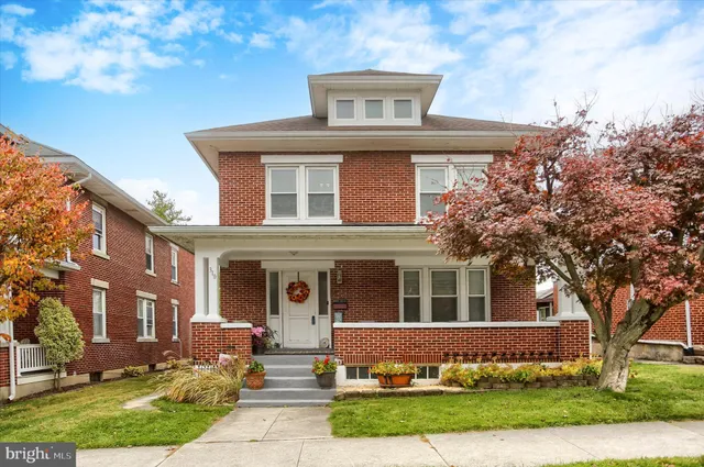front view of house with a yard