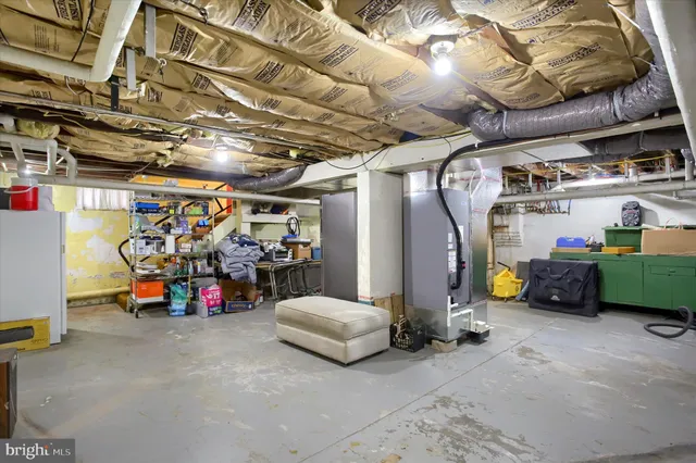 a view of a patio with table and chairs