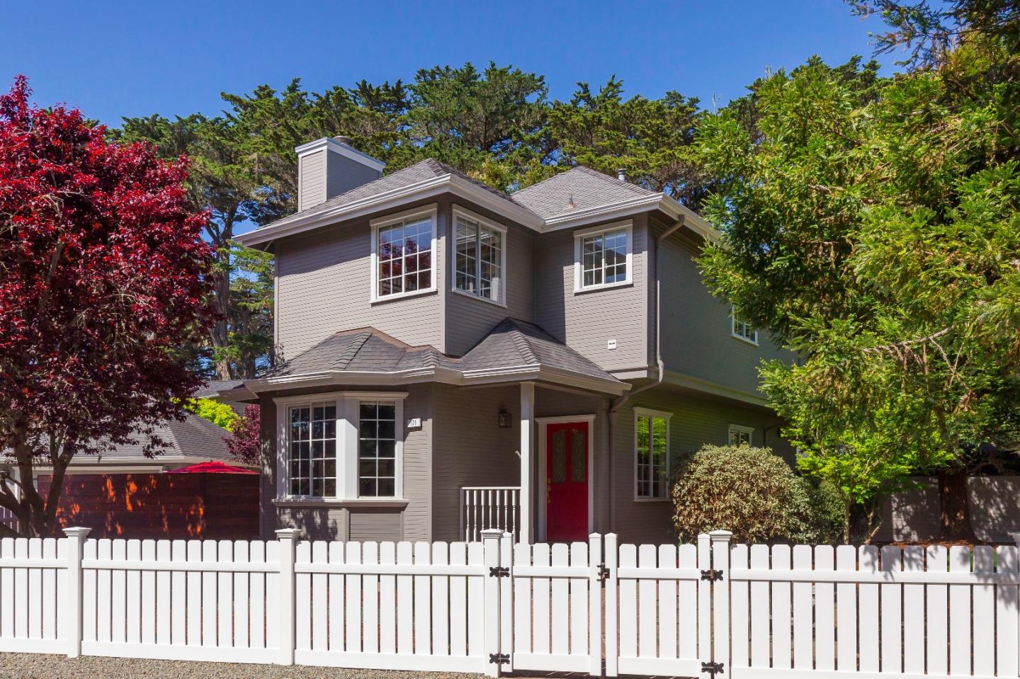 171 Alton Avenue Moss Beach, CA 94038 - Photo 3 of 24 a front view of a house with a garden