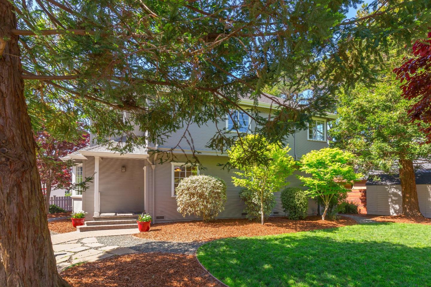 171 Alton Avenue Moss Beach, CA 94038 - Photo 4 of 24 a front view of a house with a garden
