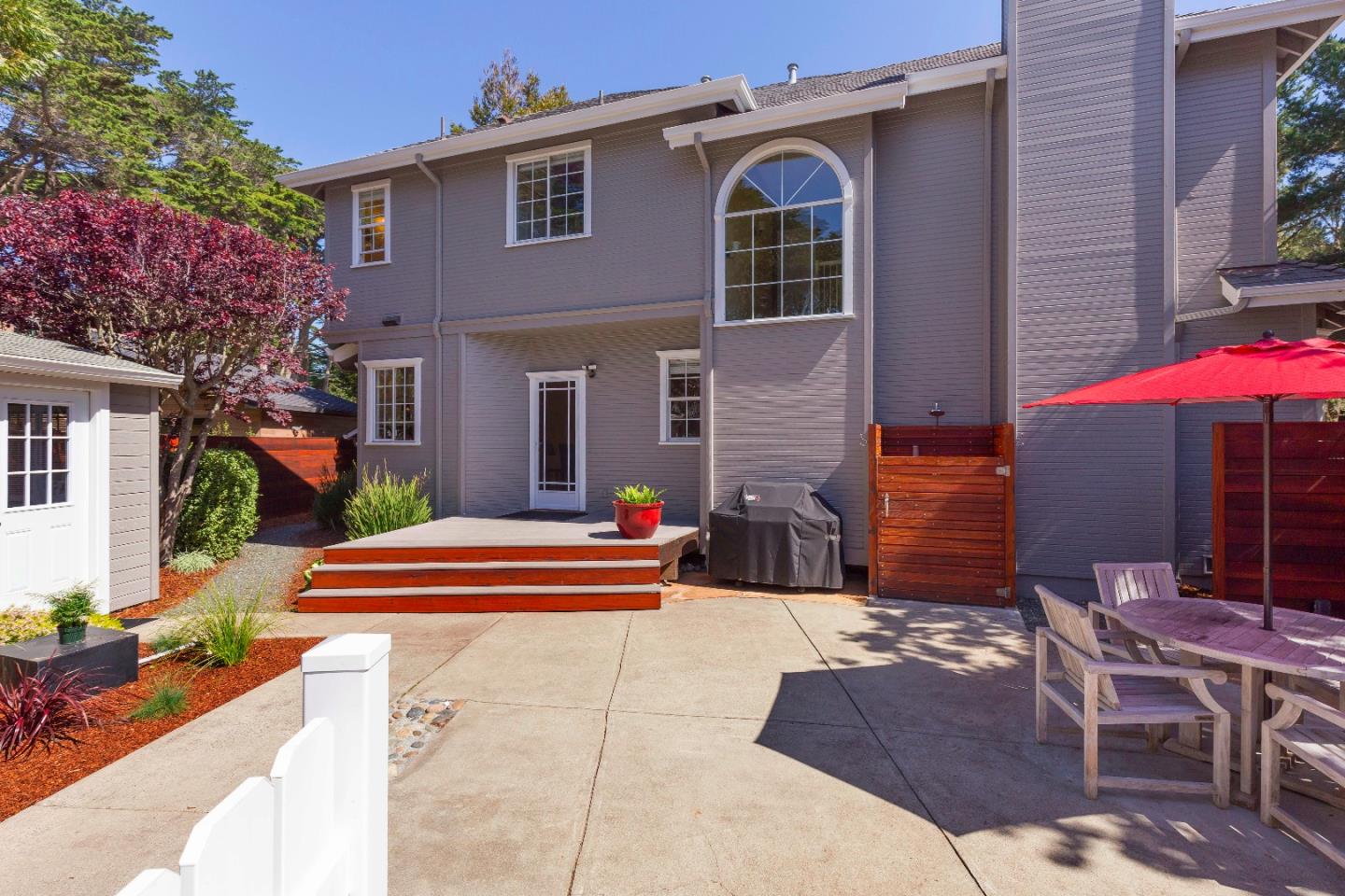 171 Alton Avenue Moss Beach, CA 94038 - Photo 7 of 24 a front view of house with yard outdoor seating and barbeque oven