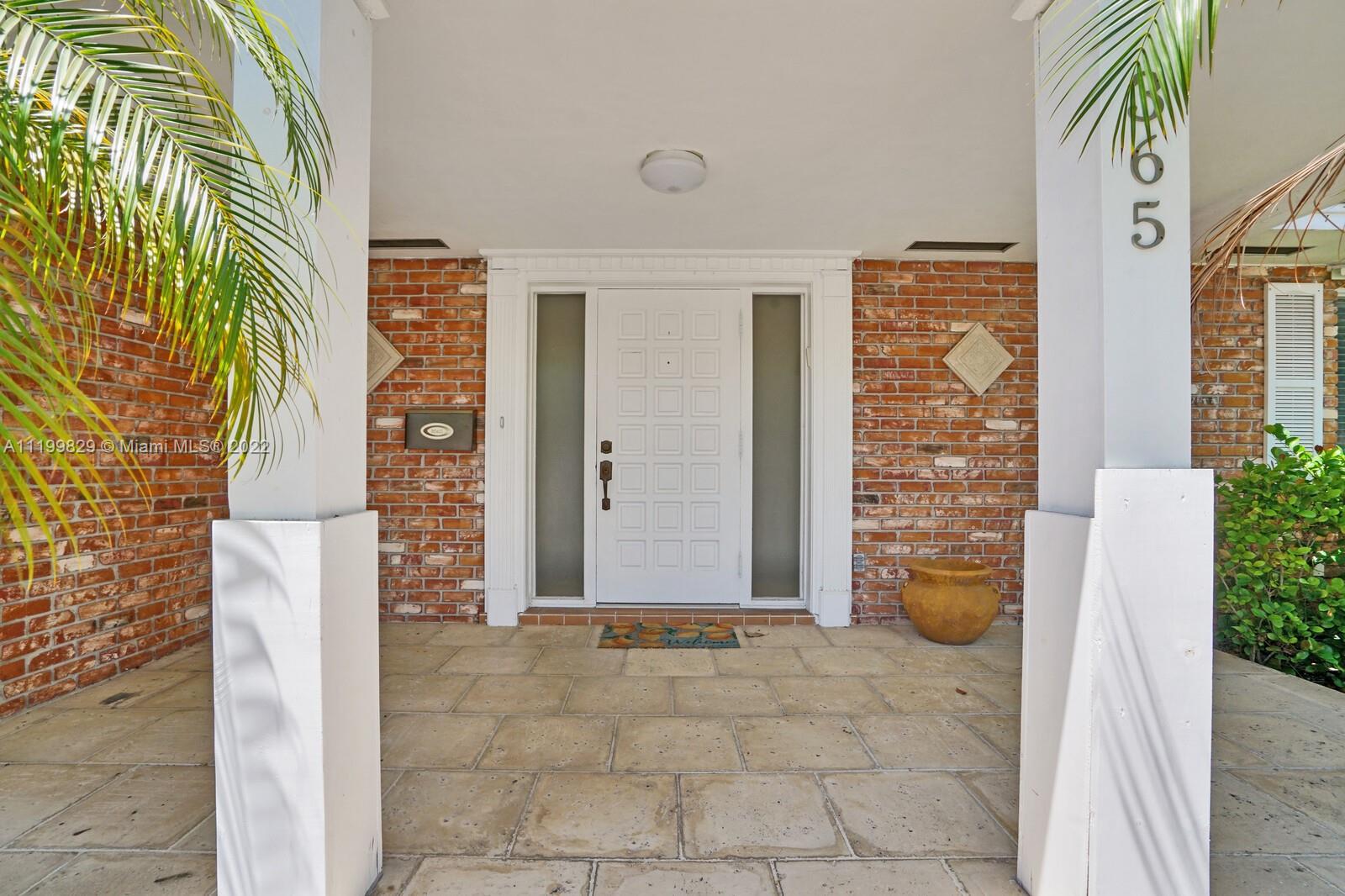 365 Northeast 3rd Street Boca Raton, FL 33432 - Photo 5 of 25 a view of a entryway with interior of house