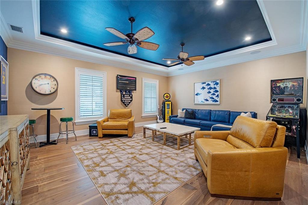 140 3rd Avenue South Naples, FL 34102 - Photo 25 of 46 a living room with furniture and a large window