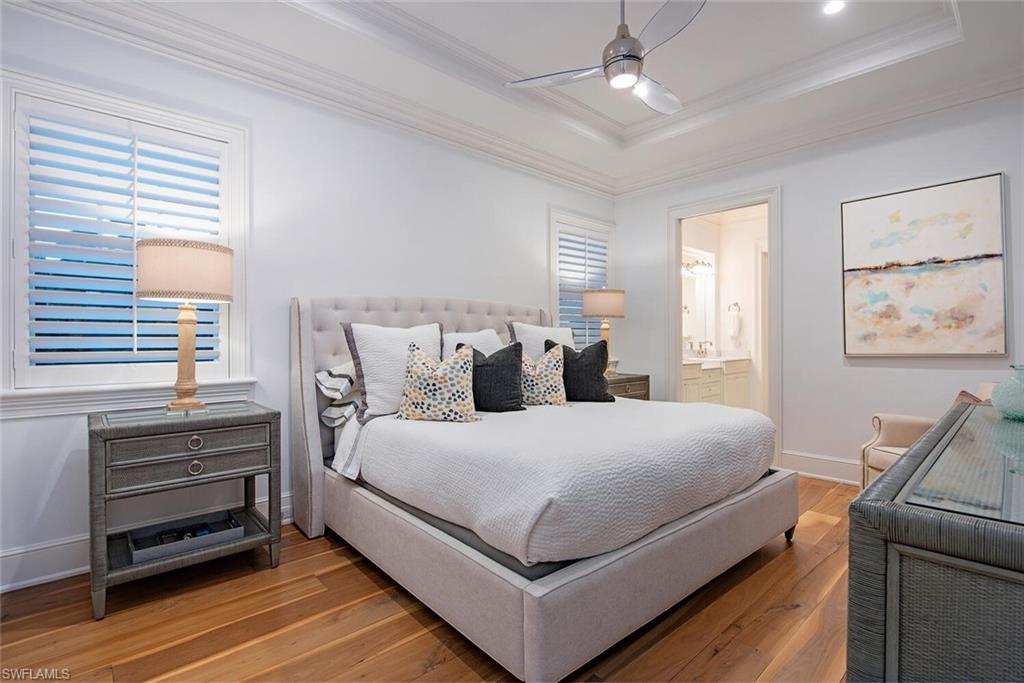 140 3rd Avenue South Naples, FL 34102 - Photo 29 of 46 a bedroom with a bed and window