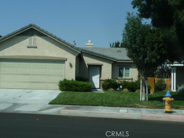 14834 Bronco Road Victorville, CA 92394 - Photo 1 of 1 a front view of a house with a yard