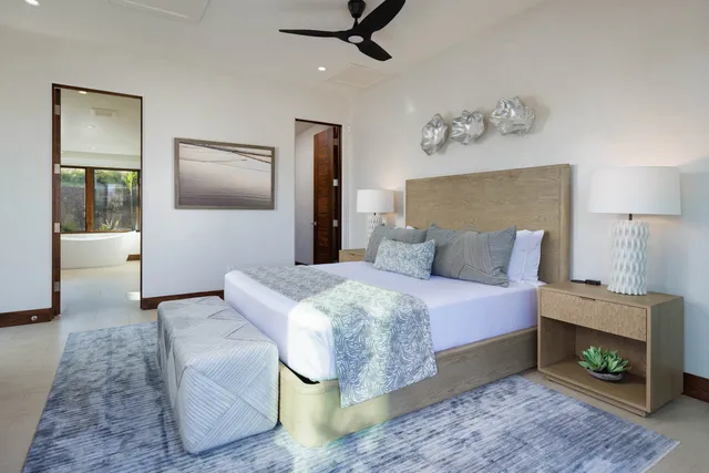 a bed room with a bed and a fireplace