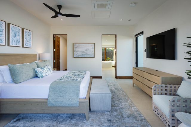 a living room with a couch and a flat screen tv