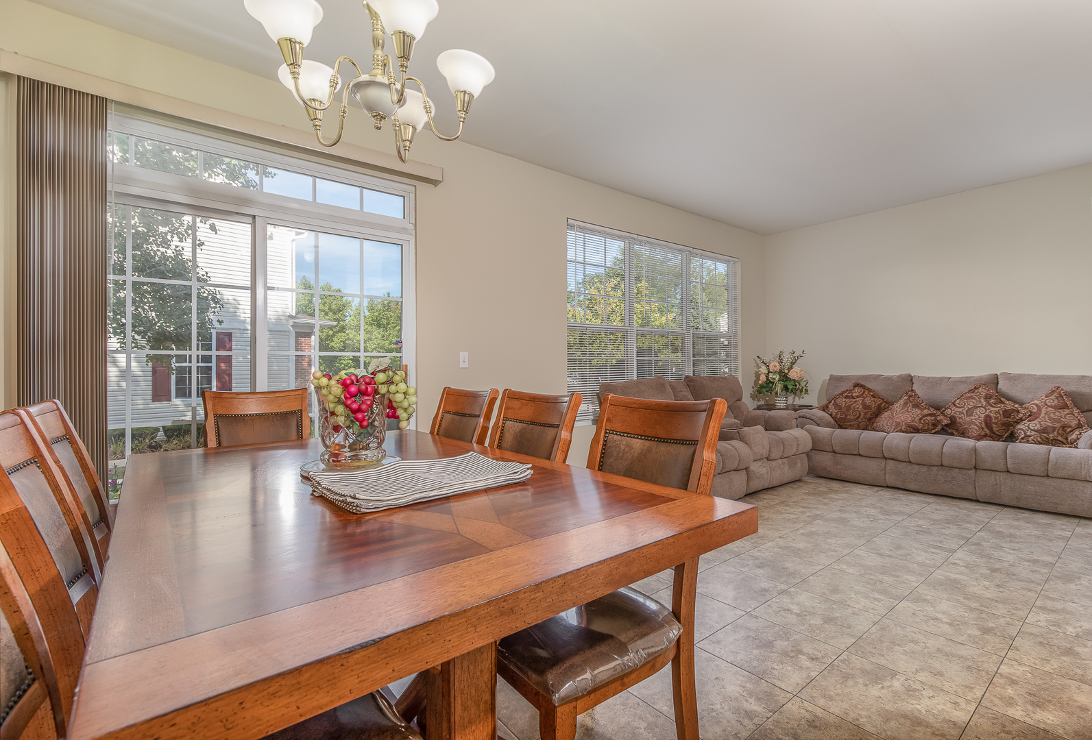 1902 Crestview Circle, Unit 1902 Romeoville, IL 60446 - Photo 11 of 32 a living room with furniture and a large window