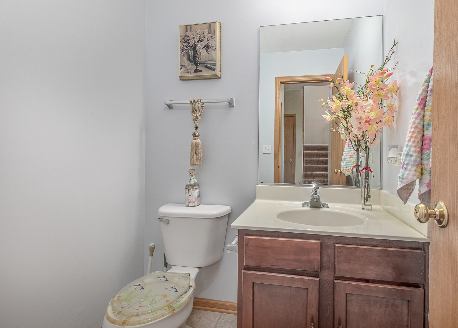 1902 Crestview Circle, Unit 1902 Romeoville, IL 60446 - Photo 15 of 32 a bathroom with a sink vanity mirror and toilet