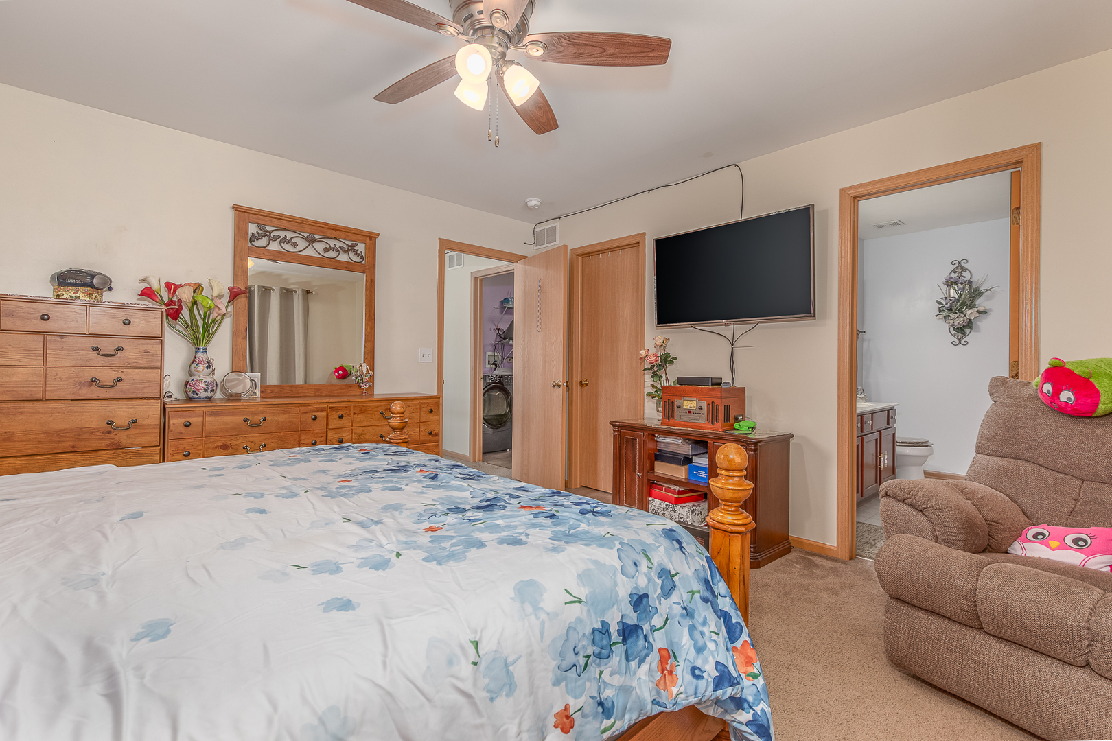 1902 Crestview Circle, Unit 1902 Romeoville, IL 60446 - Photo 20 of 32 a bedroom with a bed and a flat screen tv