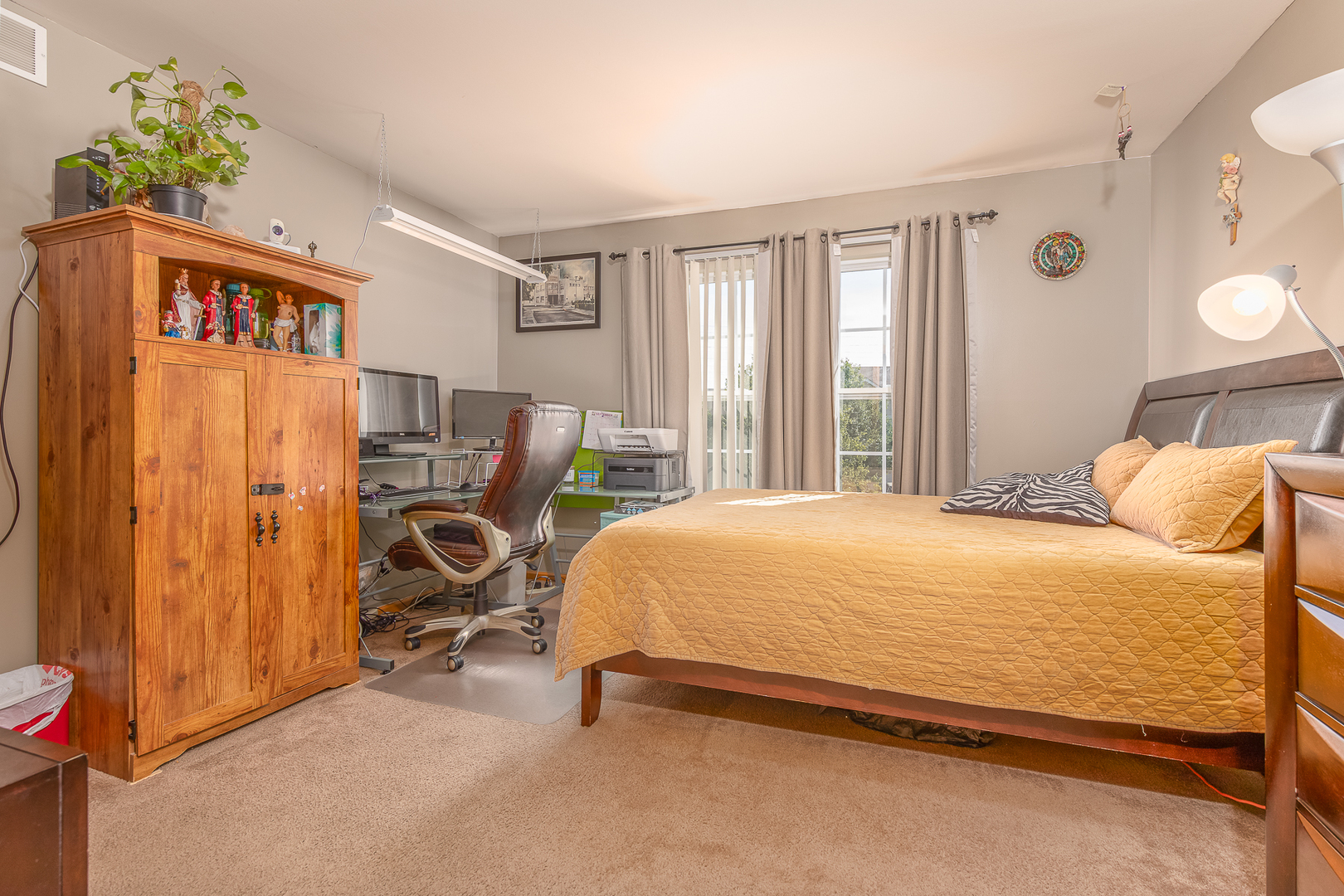 1902 Crestview Circle, Unit 1902 Romeoville, IL 60446 - Photo 23 of 32 a bedroom with a bed and a window