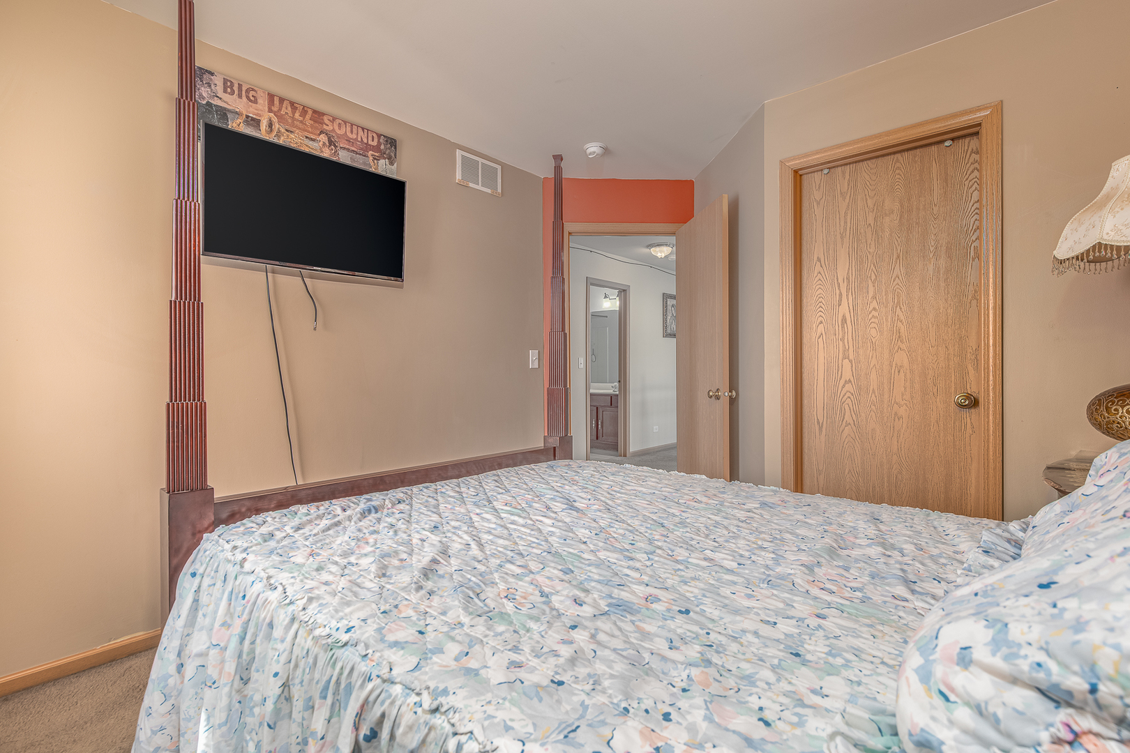 1902 Crestview Circle, Unit 1902 Romeoville, IL 60446 - Photo 26 of 32 a bedroom with a bed and a flat screen tv
