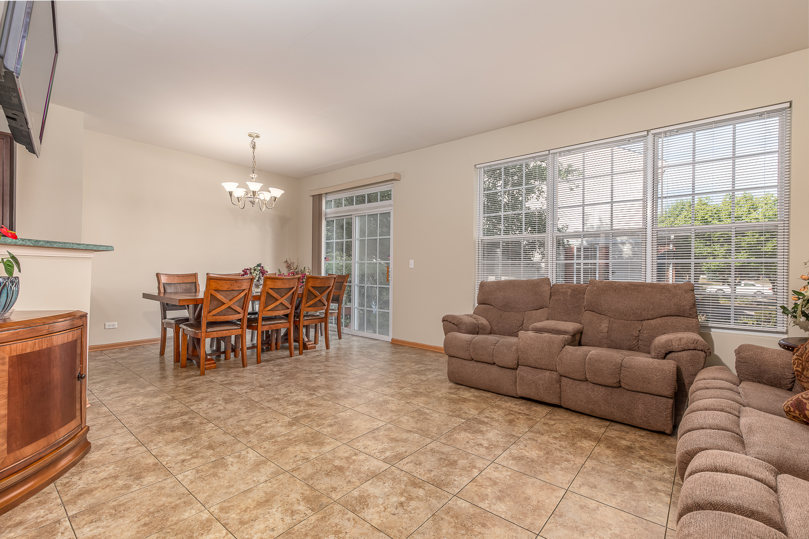1902 Crestview Circle, Unit 1902 Romeoville, IL 60446 - Photo 8 of 32 a living room with furniture and a large window