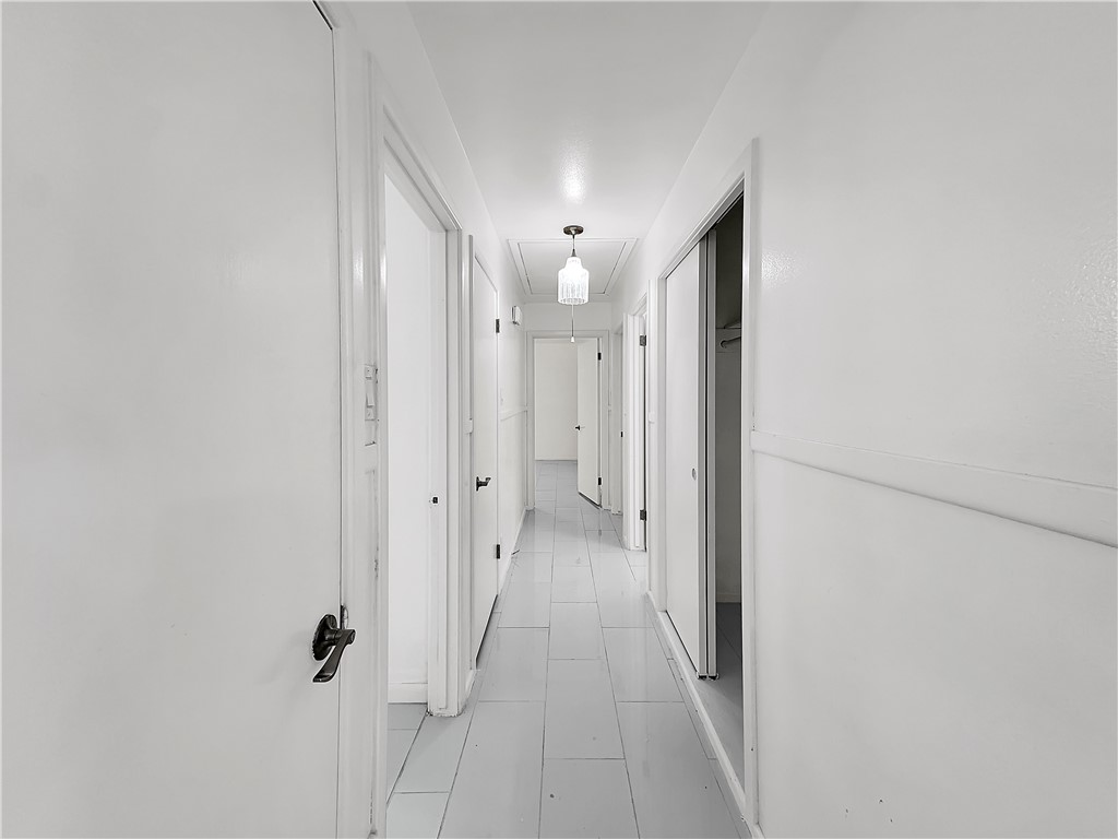 4115 Meridian Place Corpus Christi, TX 78411 - Photo 18 of 24 a view of a hallway with wooden floor