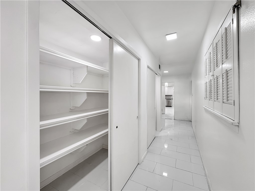4115 Meridian Place Corpus Christi, TX 78411 - Photo 19 of 24 a bathroom with a sink and a mirror
