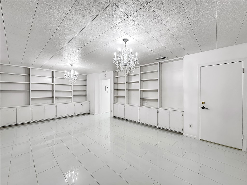 4115 Meridian Place Corpus Christi, TX 78411 - Photo 20 of 24 a view of a livingroom with a dishwasher and cabinets