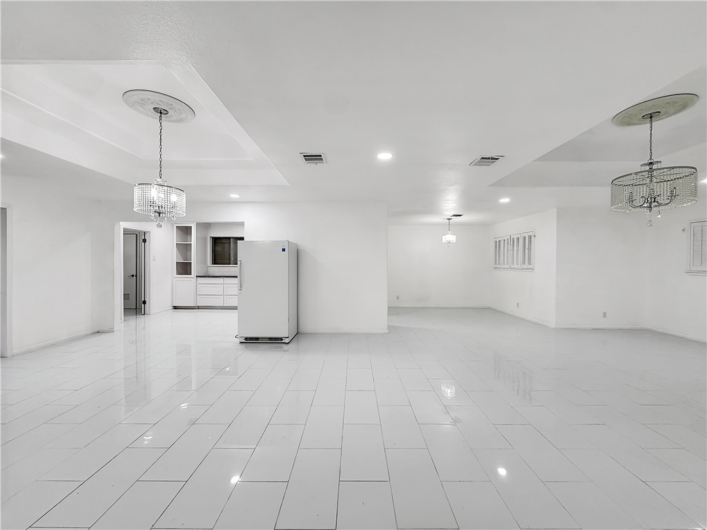 4115 Meridian Place Corpus Christi, TX 78411 - Photo 4 of 24 a view of a kitchen with a sink and a stove top oven