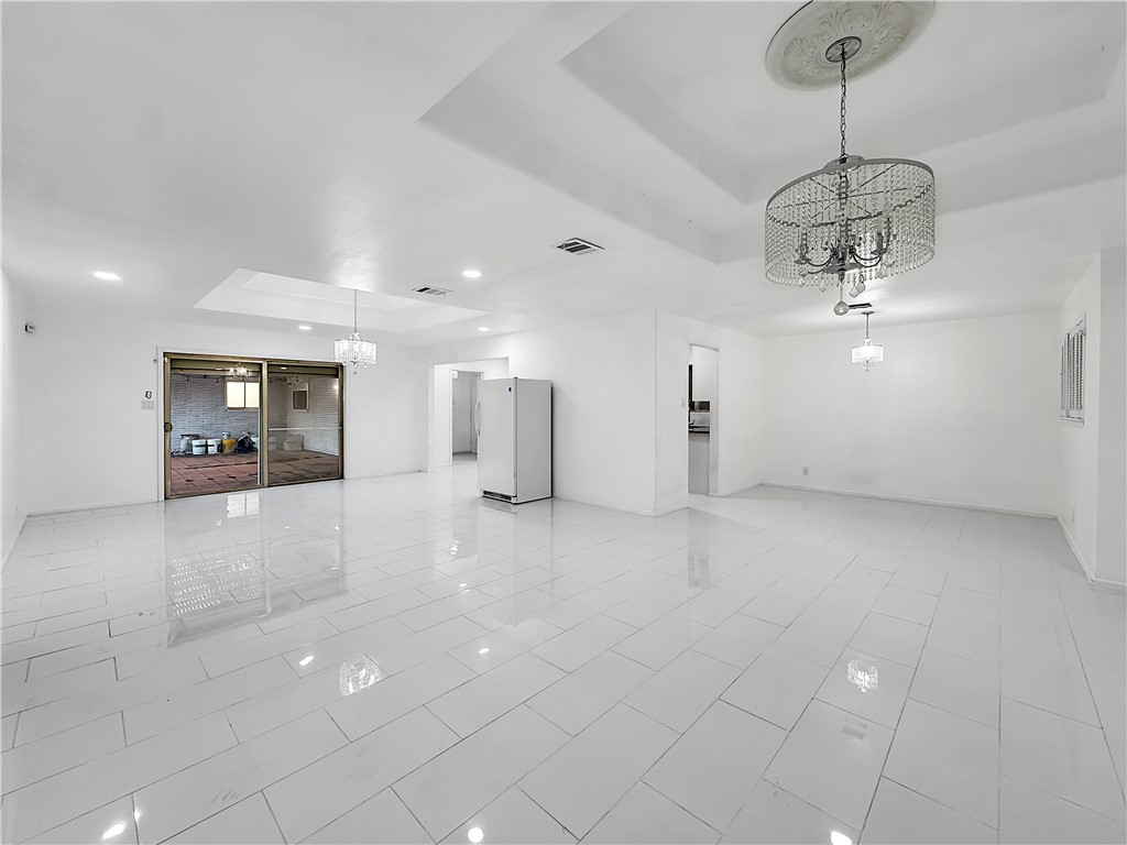 4115 Meridian Place Corpus Christi, TX 78411 - Photo 5 of 24 a view of a kitchen with a sink and a chandelier