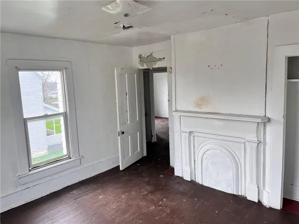 a view of a hallway with a washer and dryer