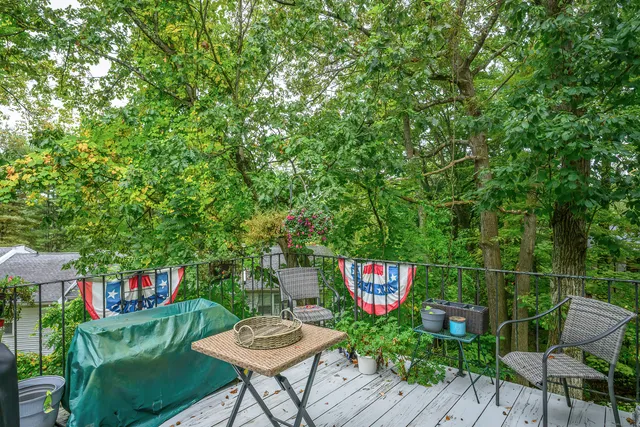 a view of a chairs and table in a patio