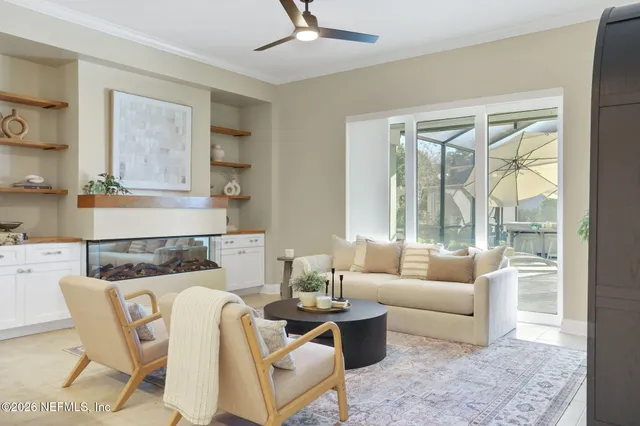 a view of a backyard with plants and a patio