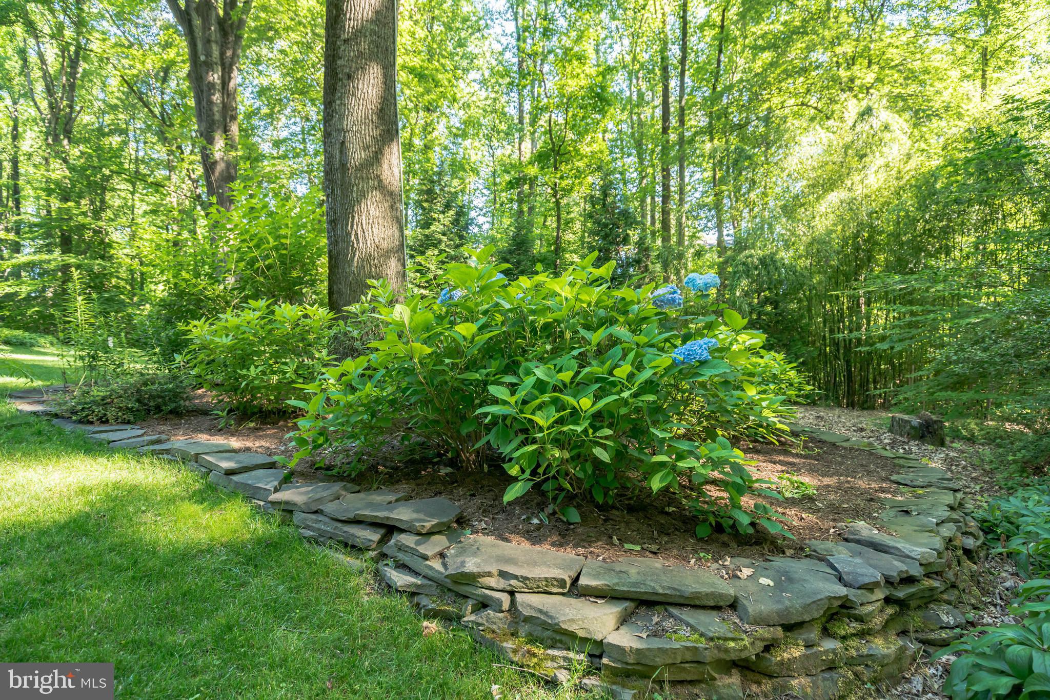 53 Jewell Road Dunkirk, MD 20754 - Photo 37 of 59 Stone landscape beds accent plantings