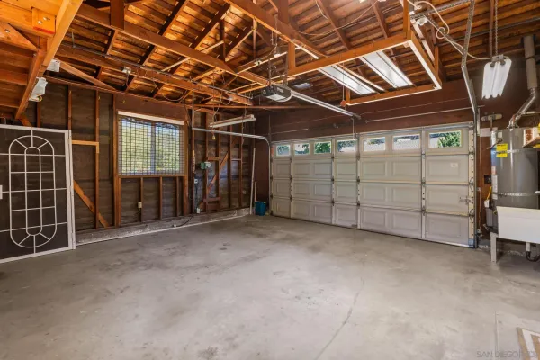 a view of a room with wooden walls
