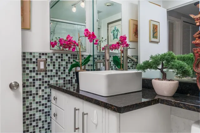 a bedroom with furniture and a chair