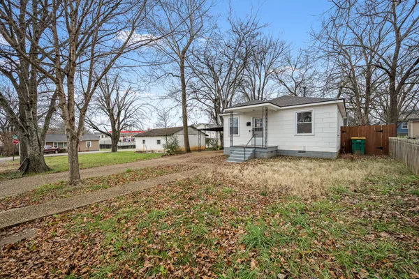 a house with trees in front of it