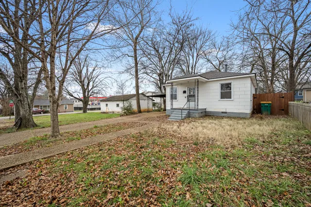 a house with trees in front of it