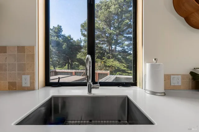 a view of a living room and window