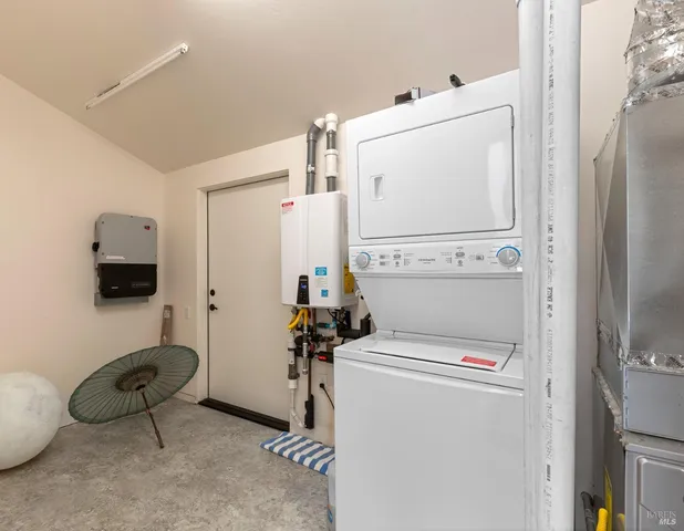 a bathroom with a shower and a mirror