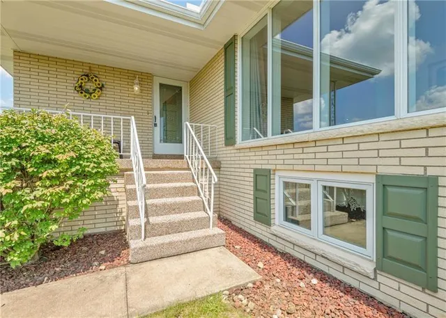 a front view of a house with a window